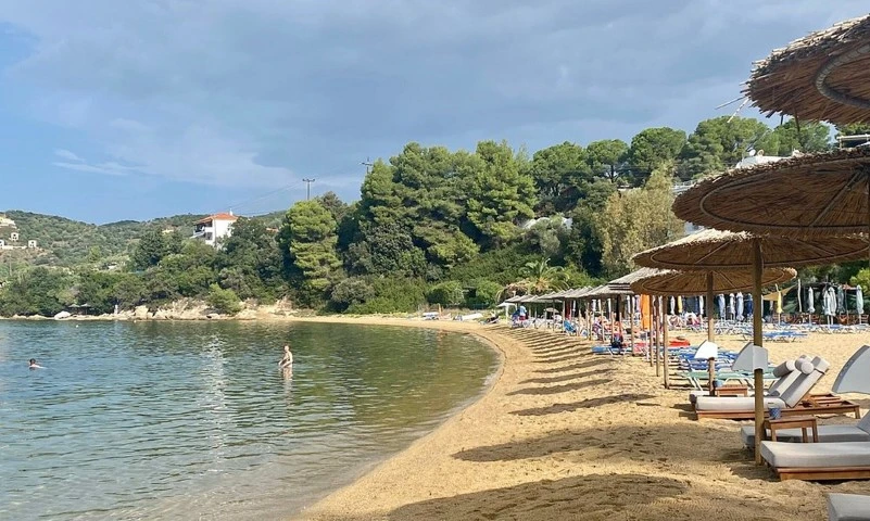 Kolios Beach in Skiathos with golden sand and crystal clear waters